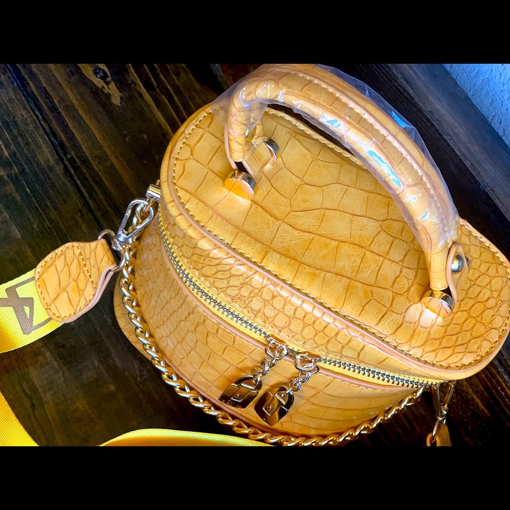 Crocodile print Satchel Bucket the color Yellow.